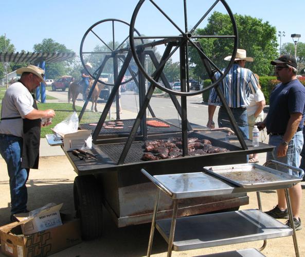 Picture of the chuck wagon grill, people grilling tri-tip